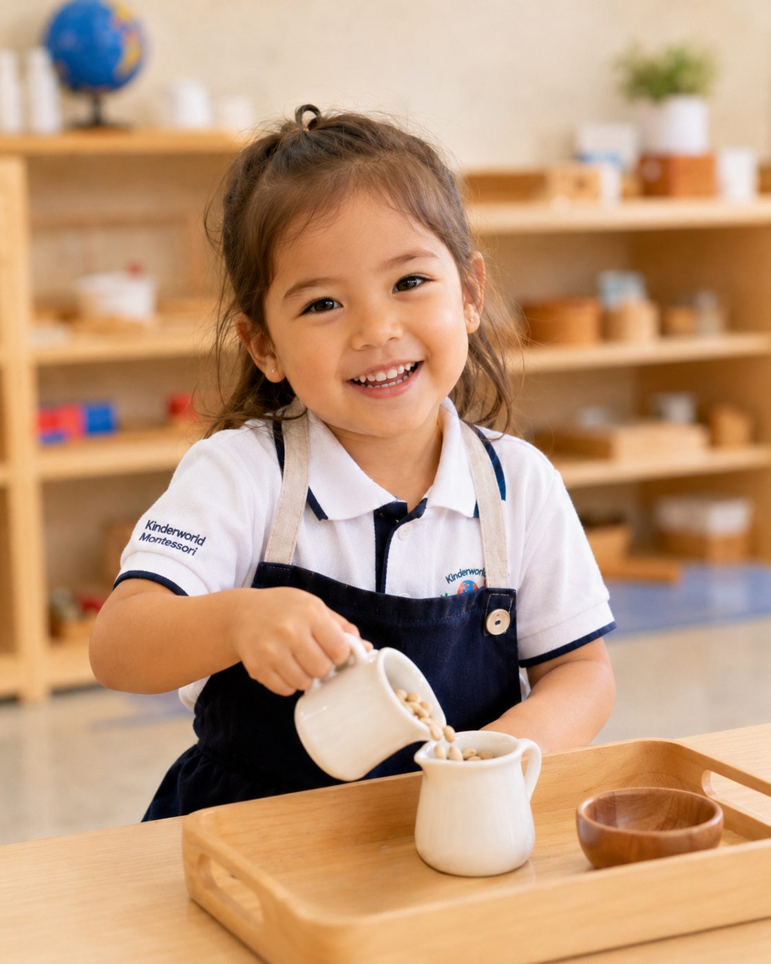 A young Kinderworld Montessori student